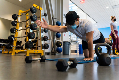 student in plank position testing balance